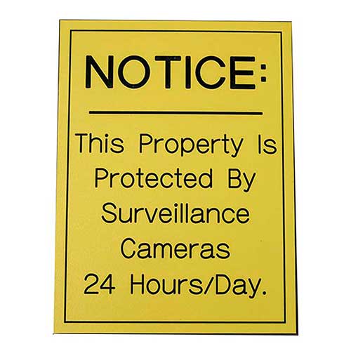 Office Sign (yellow): NOTICE: Surveillance Cameras 24 Hours/Day